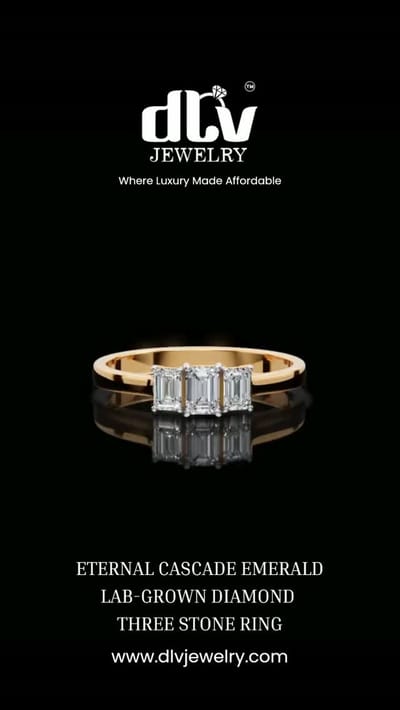 Emerald cut, three stone.

Step cuts do not sparkle the way a round does. They flash — long, clean planes of light. Some
