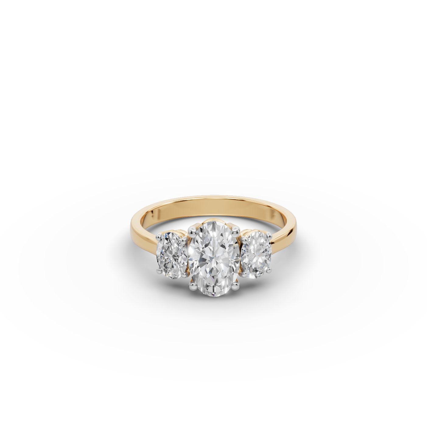 Royal Aura Oval Lab-Grown Diamond Three Stone Ring in yellow gold, set with lab-grown diamonds
