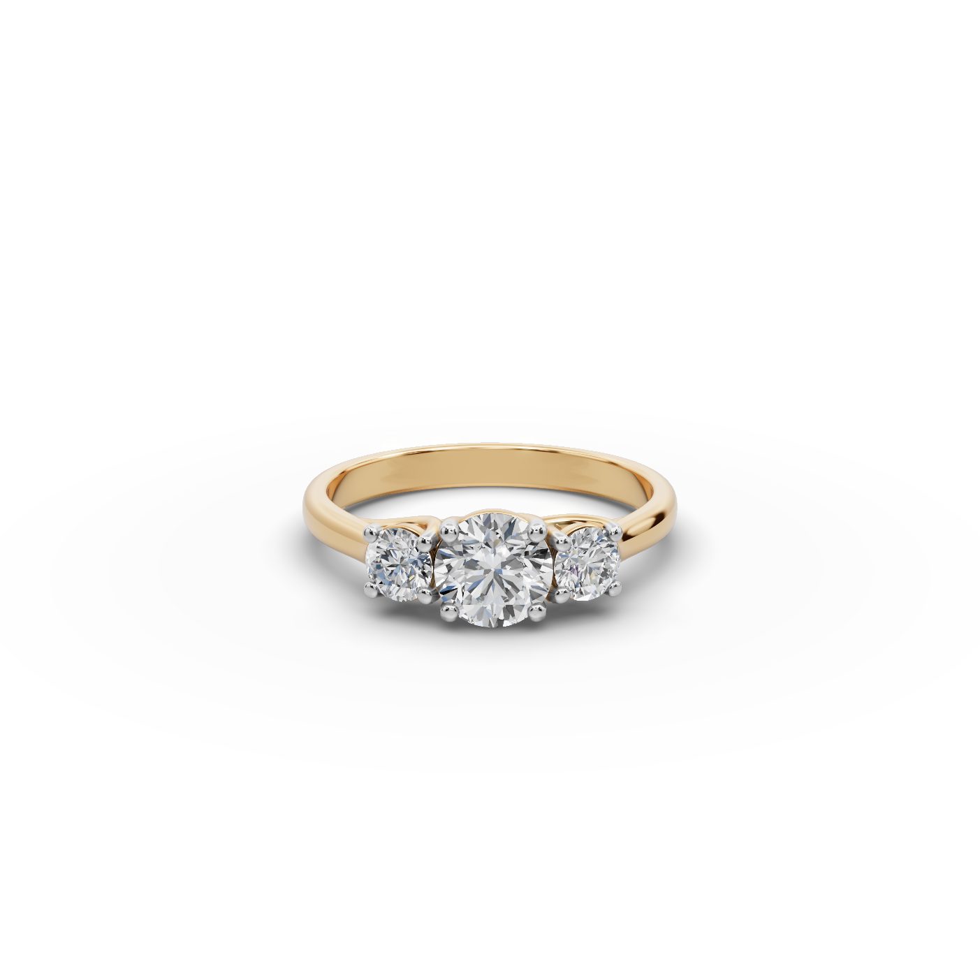 Regal Glow Round Lab-Grown Diamond Three Stone Ring in yellow gold, set with lab-grown diamonds