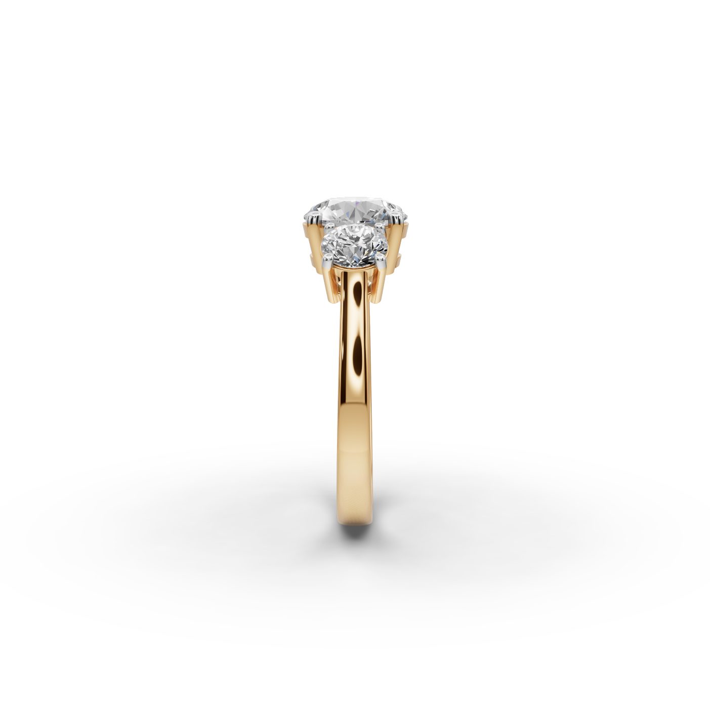 Regal Light Round Lab-Grown Diamond Three Stone Ring in yellow gold